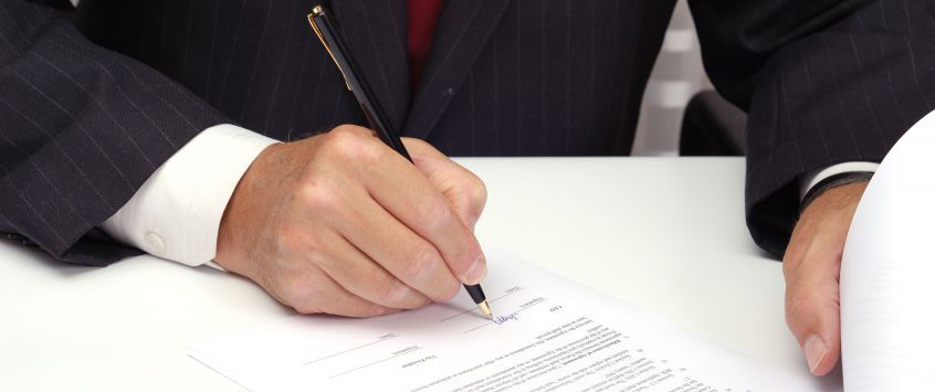 Man-Signing-Paper-1.jpg